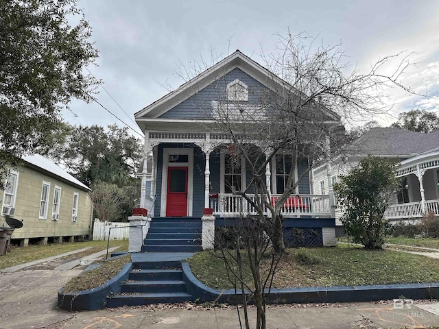 view of front of property featuring covered porch