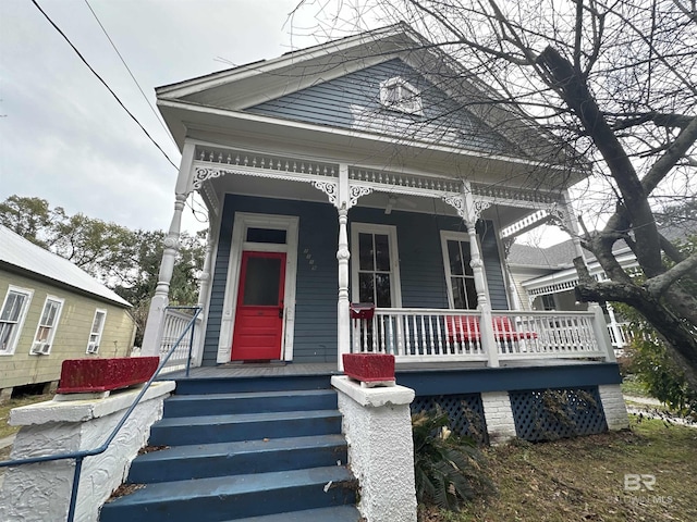 view of front of property featuring covered porch