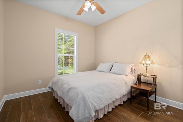 9529 Aspen Cir, Daphne, AL 36527 - bedroom featuring baseboards and wood finished floors