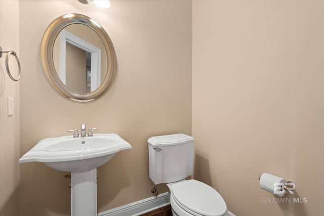 9529 Aspen Cir, Daphne, AL 36527 - bathroom featuring toilet and baseboards