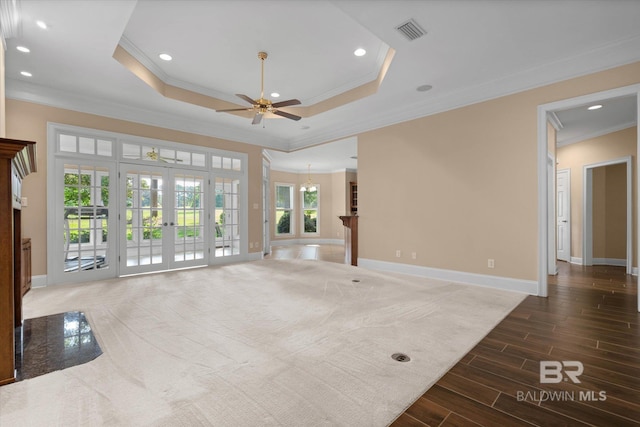 9529 Aspen Cir, Daphne, AL 36527 - unfurnished living room featuring ornamental molding, french doors, baseboards, ceiling fan, and wood finished floors
