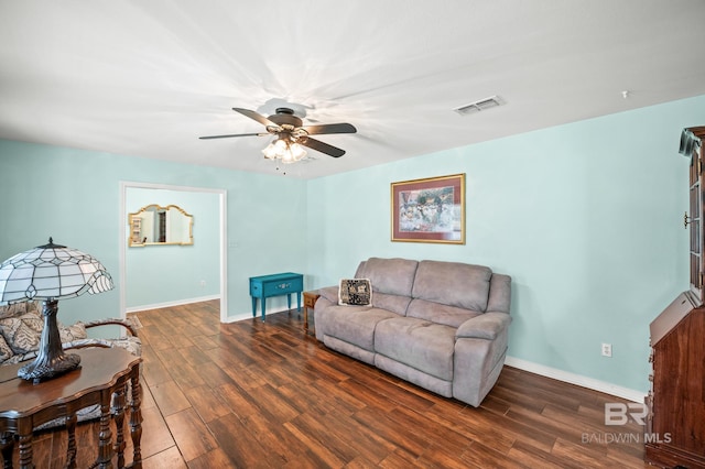 2553 Santa Rosa Dr, Lillian, AL 36549 - living area featuring ceiling fan, wood finished floors, and baseboards