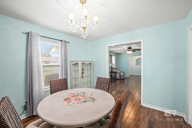 2553 Santa Rosa Dr, Lillian, AL 36549 - dining area featuring baseboards, a chandelier, and wood finished floors