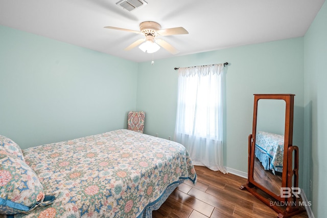 2553 Santa Rosa Dr, Lillian, AL 36549 - bedroom featuring wood finished floors, baseboards, and ceiling fan