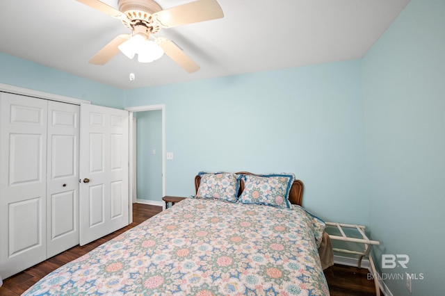 2553 Santa Rosa Dr, Lillian, AL 36549 - bedroom with dark wood-type flooring, a closet, ceiling fan, and baseboards