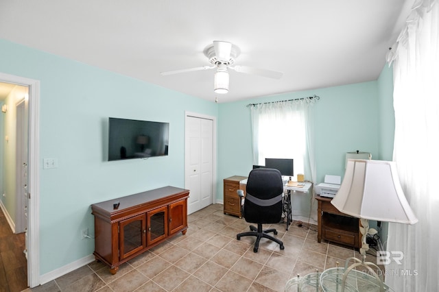 2553 Santa Rosa Dr, Lillian, AL 36549 - office space with a ceiling fan, light tile patterned floors, and baseboards