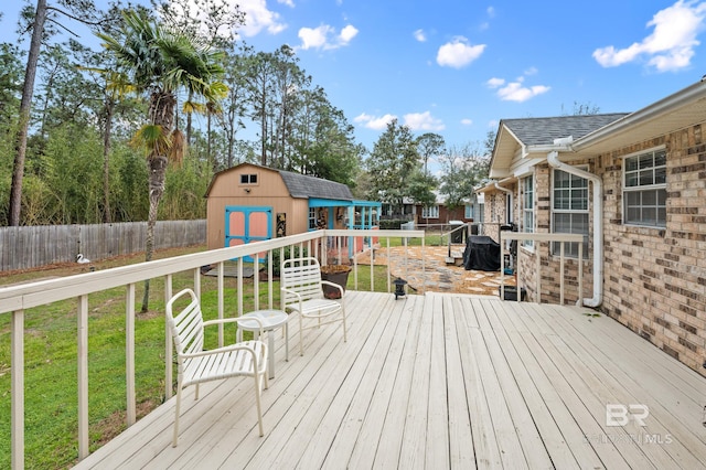 2553 Santa Rosa Dr, Lillian, AL 36549 - wooden deck featuring an outbuilding and a storage unit