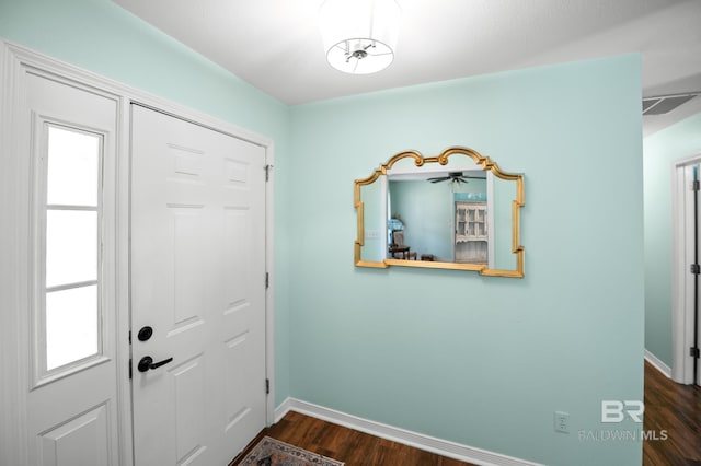 2553 Santa Rosa Dr, Lillian, AL 36549 - foyer featuring baseboards and dark wood-style floors