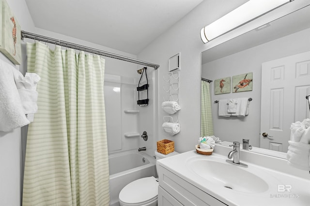 full bathroom featuring shower / tub combo, vanity, and toilet