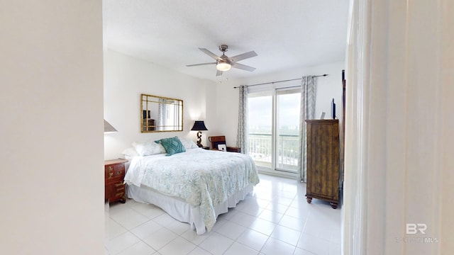 tiled bedroom featuring access to outside and ceiling fan