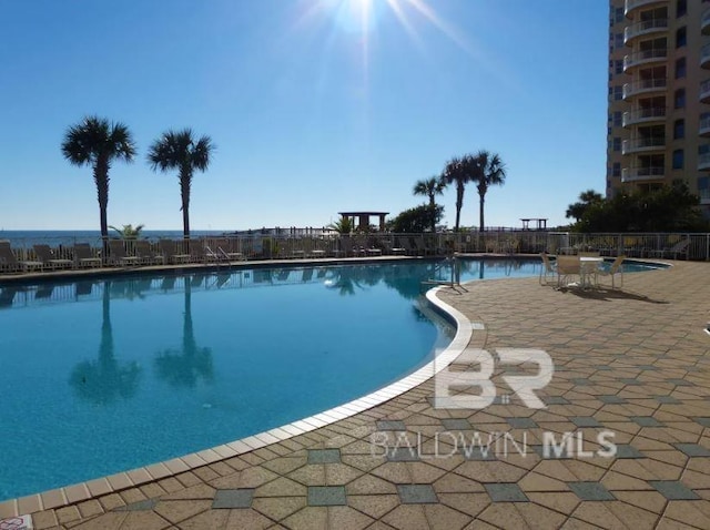 view of pool featuring a patio area