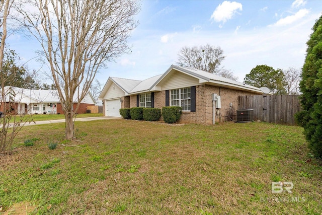 ranch-style home featuring a garage, driveway, fence, central AC, and brick siding