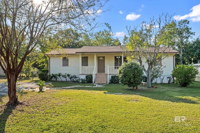 ranch-style home with a front yard