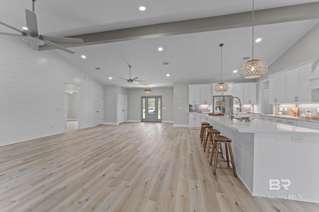 LOT9 Tall Timber Ln, Elberta, AL 36530 - kitchen featuring ceiling fan, high vaulted ceiling, white cabinetry, light wood-type flooring, and light countertops