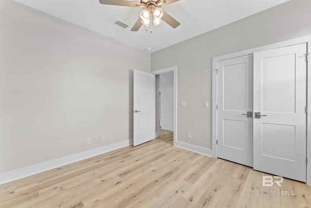 LOT9 Tall Timber Ln, Elberta, AL 36530 - unfurnished bedroom featuring light wood-style floors, ceiling fan, and a closet