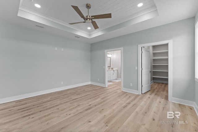 LOT9 Tall Timber Ln, Elberta, AL 36530 - unfurnished bedroom with a raised ceiling, recessed lighting, a spacious closet, light wood-style flooring, and ensuite bathroom