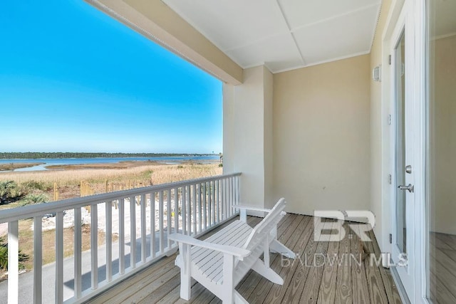 balcony featuring a water view