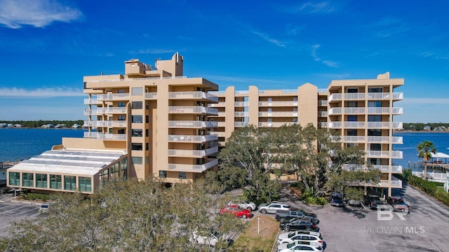 view of building exterior featuring a water view