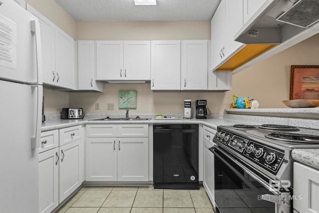 kitchen featuring white cabinets, exhaust hood, light tile patterned floors, and black appliances