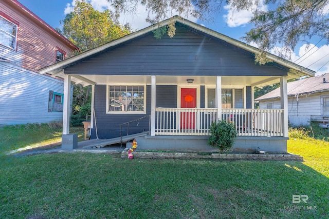 bungalow-style house featuring a front yard and a porch