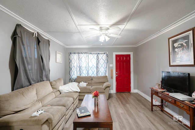 living room featuring a textured ceiling, light hardwood / wood-style floors, ceiling fan, and crown molding