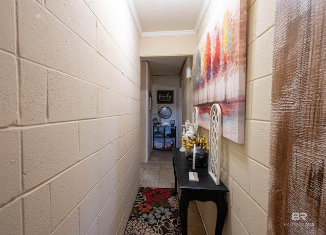 hall featuring tile patterned floors and ornamental molding