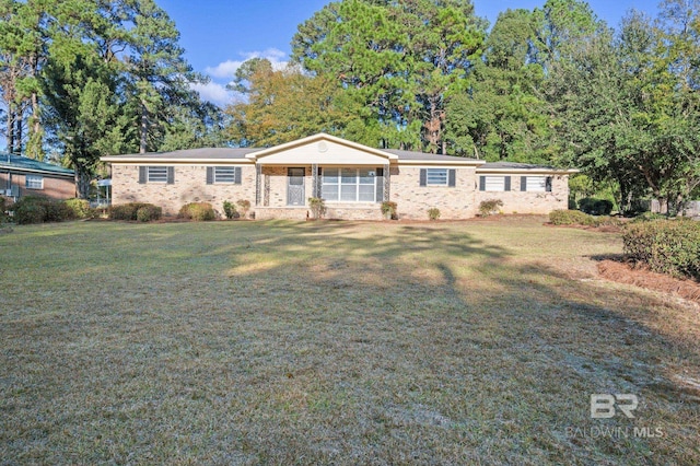 ranch-style home with a porch and a front lawn