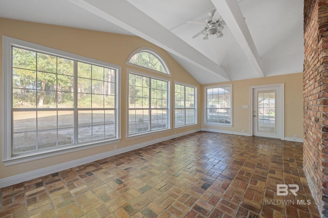 unfurnished sunroom featuring vaulted ceiling and ceiling fan