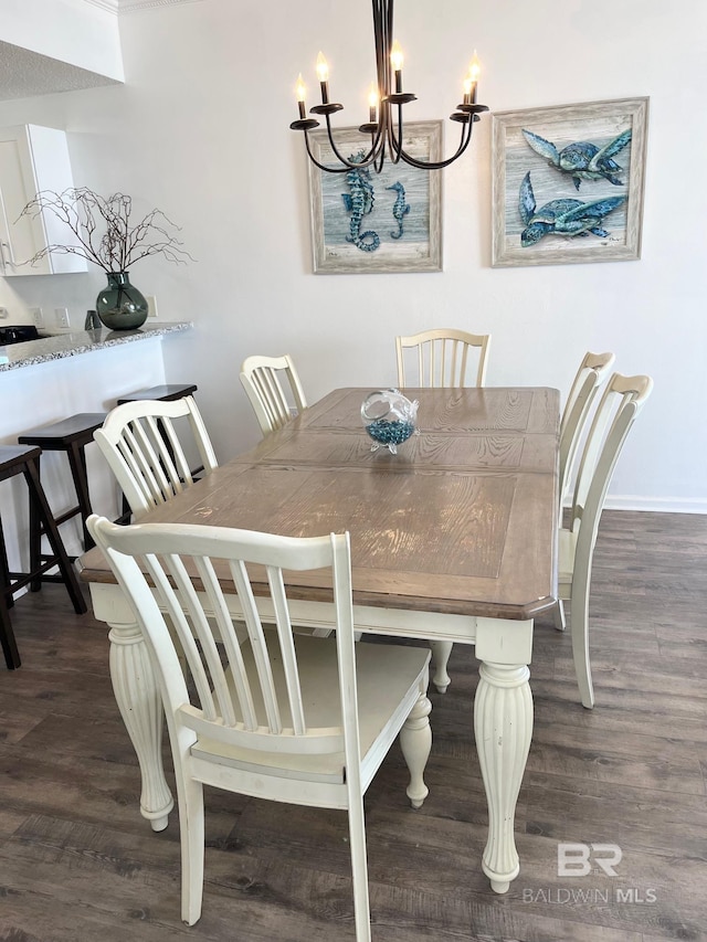 dining room with dark wood-type flooring and baseboards