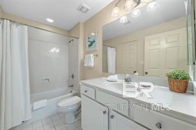 full bathroom featuring toilet, vanity, shower / bathtub combination with curtain, and tile flooring