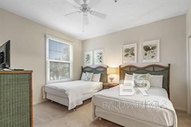 bedroom featuring ceiling fan