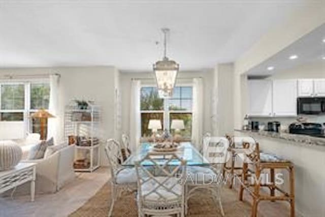 dining area with a chandelier