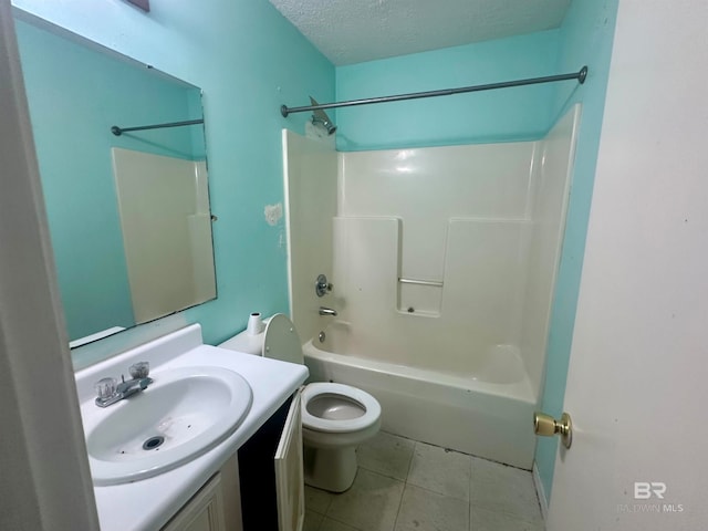 full bathroom with tile patterned floors, a textured ceiling, toilet, vanity, and shower / bathtub combination