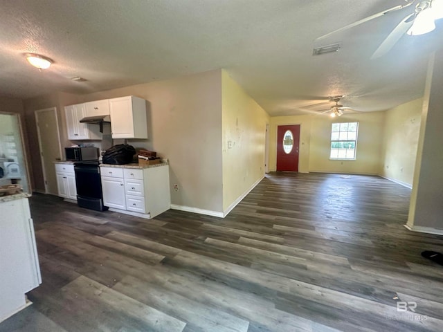 kitchen with dark wood-type flooring, white cabinets, ceiling fan, a textured ceiling, and extractor fan