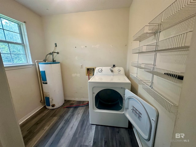 clothes washing area featuring water heater, hookup for a washing machine, and dark hardwood / wood-style floors