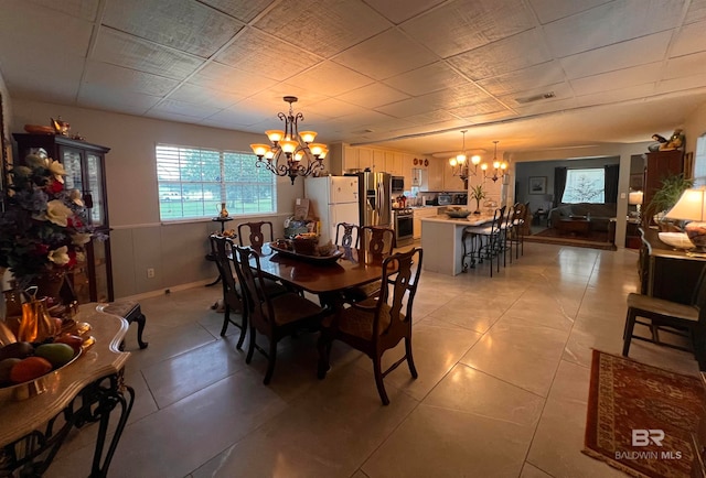 dining area with a chandelier