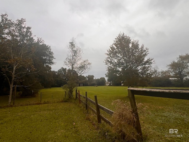 view of yard with a rural view