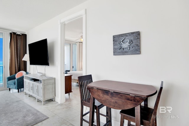 dining room with a ceiling fan