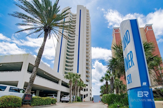 view of property with uncovered parking