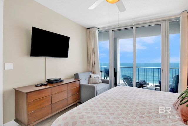 bedroom featuring access to exterior and a ceiling fan