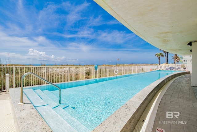 community pool featuring fence