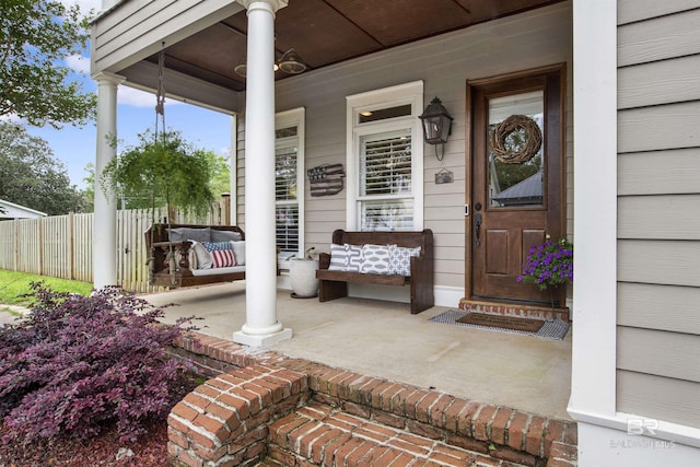 property entrance featuring a porch