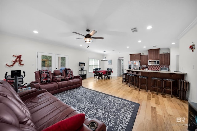 1246 Pembroke Way, Foley, AL 36535 - living area featuring ceiling fan, light wood finished floors, recessed lighting, and french doors