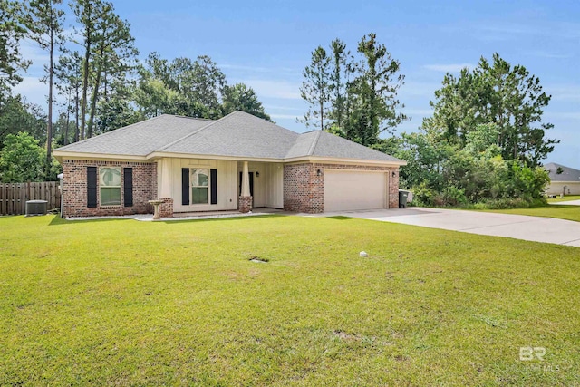 1246 Pembroke Way, Foley, AL 36535 - view of front of home featuring an attached garage, driveway, brick siding, a shingled roof, and covered porch