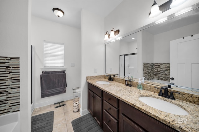 1246 Pembroke Way, Foley, AL 36535 - bathroom with a stall shower, a tub, double vanity, and tile patterned floors