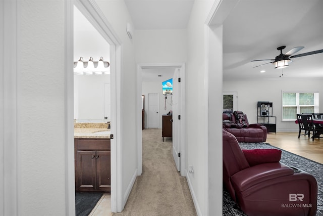 1246 Pembroke Way, Foley, AL 36535 - hall featuring a sink and light colored carpet