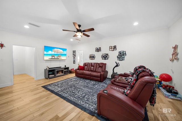 1246 Pembroke Way, Foley, AL 36535 - living room featuring a ceiling fan, wood finished floors, ornamental molding, and recessed lighting