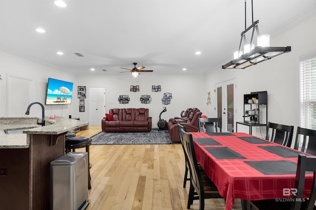 1246 Pembroke Way, Foley, AL 36535 - dining room featuring light wood finished floors, recessed lighting, ceiling fan, french doors, and ornamental molding
