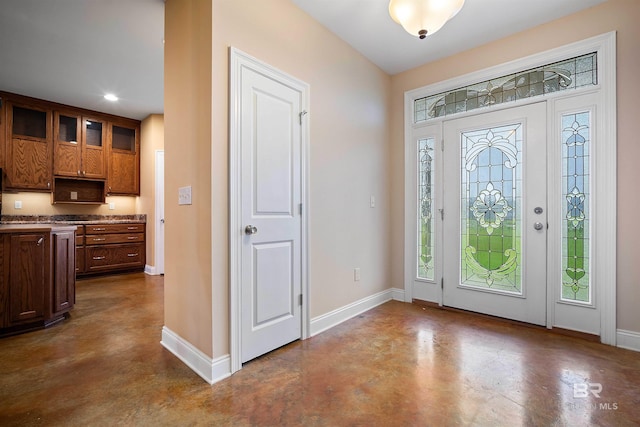 foyer featuring concrete flooring