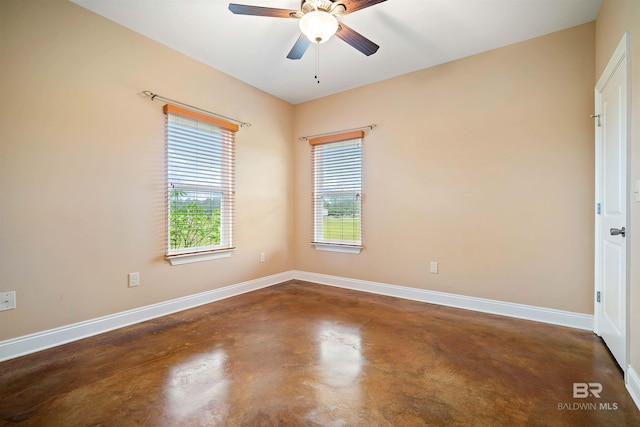 spare room featuring ceiling fan